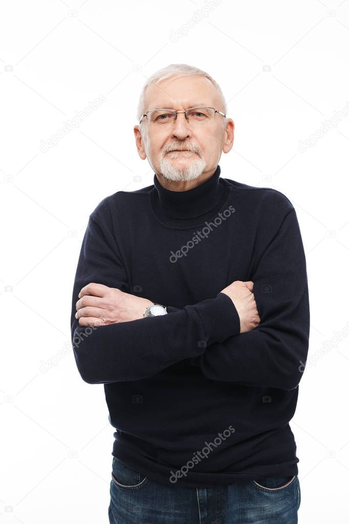 Old attractive man with gray hair and beard in eyeglasses and bl