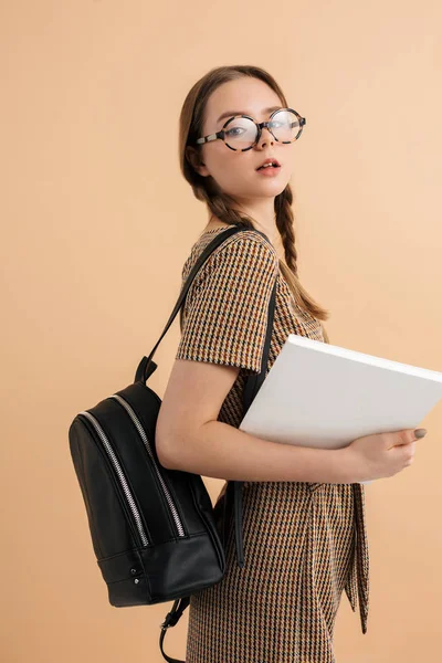 Young beautiful girl with two braids in tweed jumpsuit and moder — Stock Photo, Image