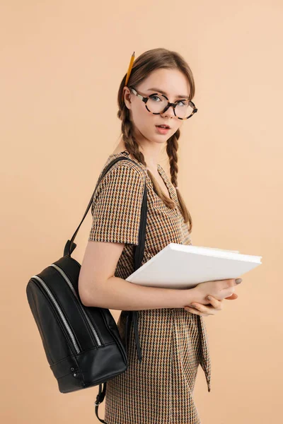 Young attractive girl with two braids in tweed jumpsuit and eyeg — Stock Photo, Image