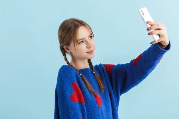 Young beautiful smiling girl with two braids in navy color overs — Stock Photo, Image