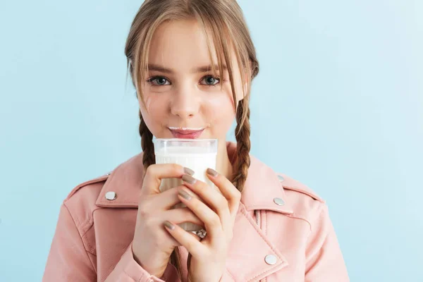 Young pretty smiling girl with two braids in pink leather jacket — 스톡 사진