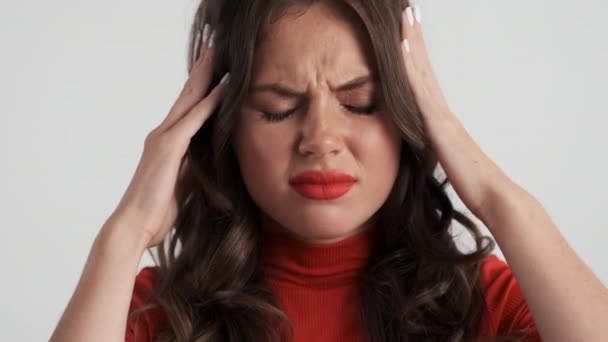 Portrait Upset Brunette Girl Showing Headache Camera Gray Background — Stock Video
