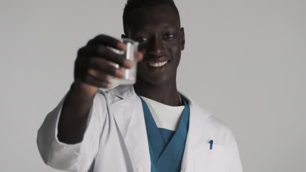 Young Handsome African American Male Doctor Happily Showing Medical Pills — Stock Video