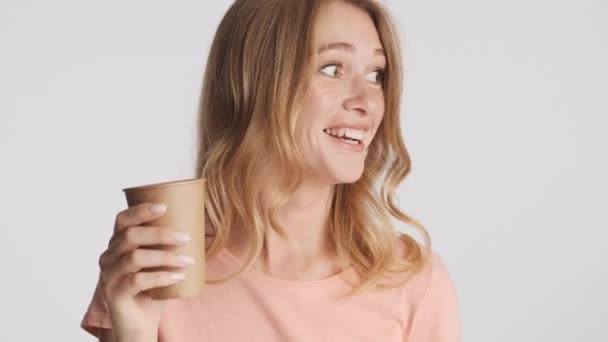 Beautiful Cheerful Blond Woman Paper Cup Happily Posing Camera Gray — Stock Video