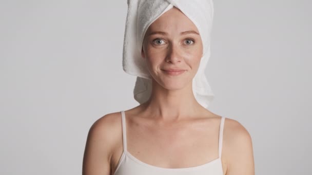 Portrait Beautiful Girl Towel Head Intently Looking Camera Gray Background — Stock Video