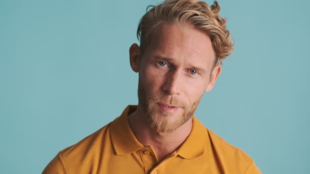 Young Blond Bearded Man Tiredly Posing Camera Colorful Background — Stock Video