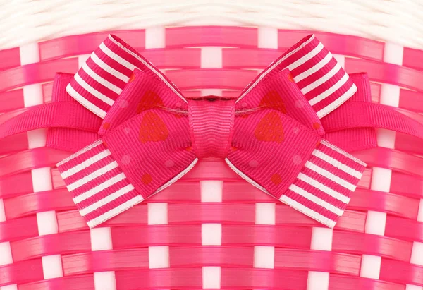 Plastic Pink Knitted Background Decorative Bow Attached Front — Stock Photo, Image