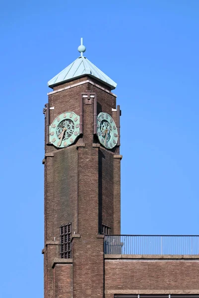 Old architecture tall tower with retro clock