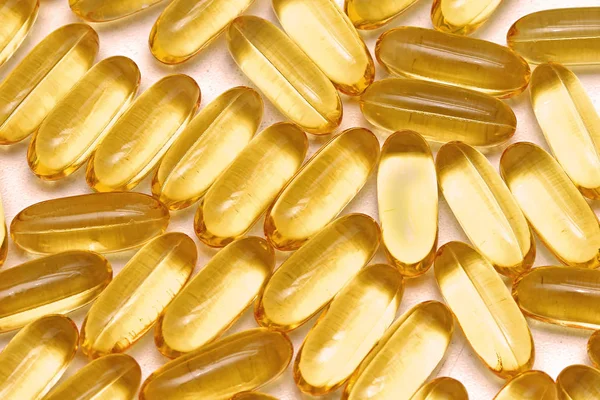 Fish Oil Vitamin Supplement Yellow Gel Capsules Pile — Stock Photo, Image