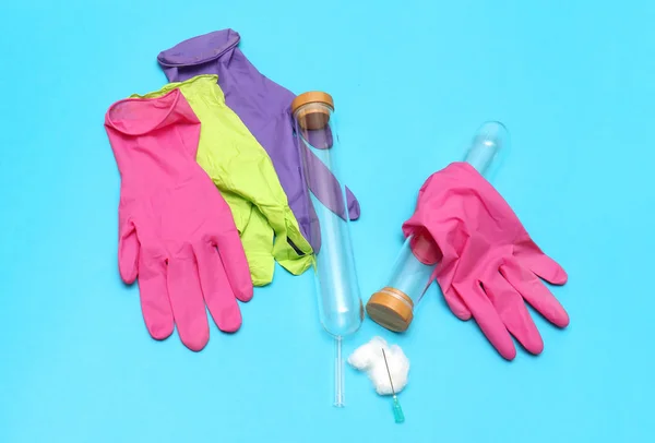 Test tubes and gloves — Stock Photo, Image