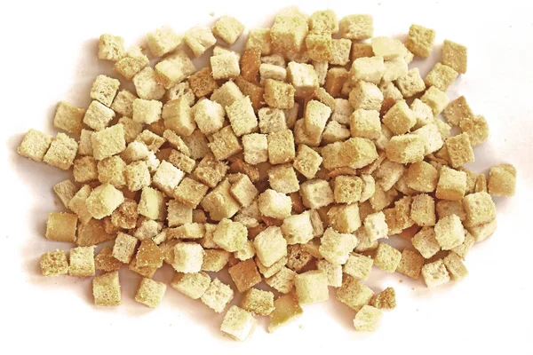 Big pile of baked bread croutons on white background — Stock Image Big Pile Baked Bread Croutons White Background Royalty Free Stock Photos