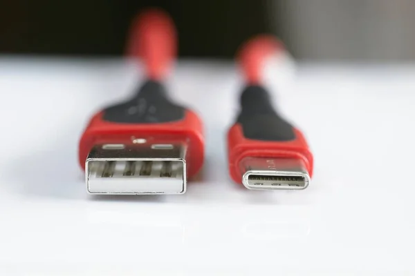 Detail of front entrance of USB versus USB-C  plugs — Stock Photo, Image