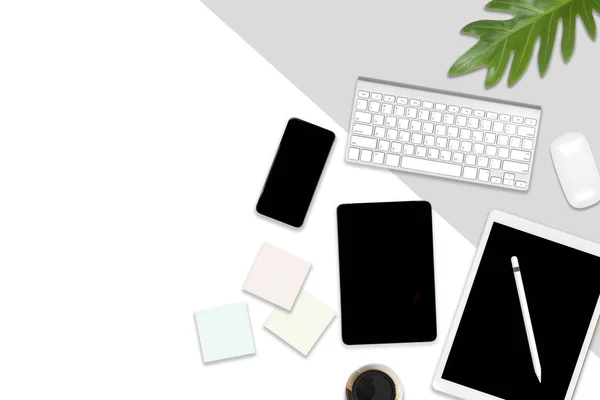 Flat lay photo of office table with laptop computer, digital tablet, mobile phone and accessories. on modern background. Desktop office mockup concept.