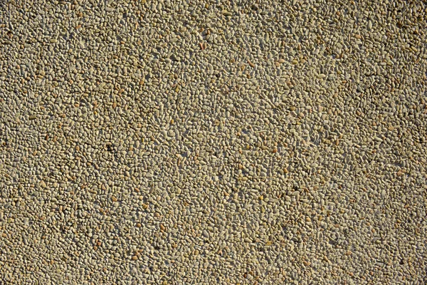 Oblázky vzor cesty v betonu, pozadí dlaždic. — Stock fotografie