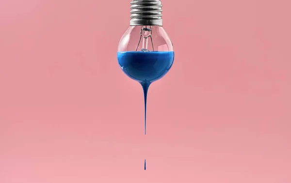 Bulb with blue paint on it — Stock Photo, Image