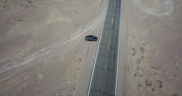 Driving dark SUV car on highway in Death Valley in USA — Stock Video