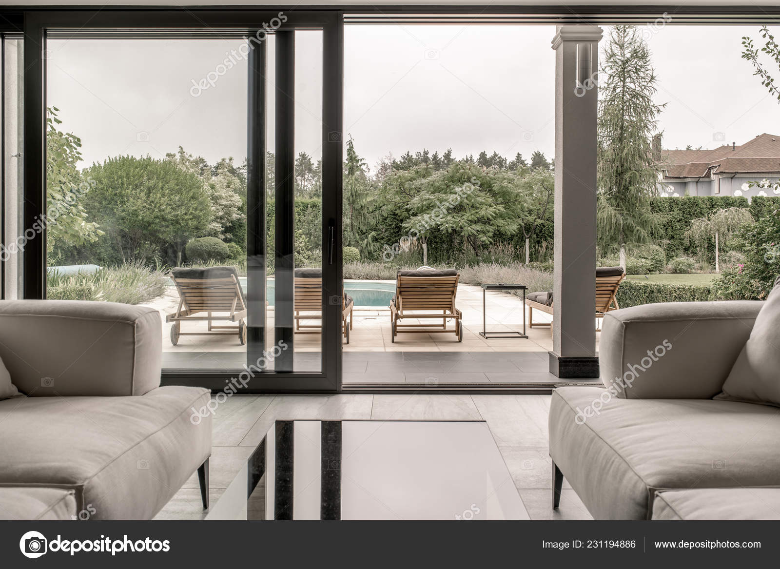 Modern Interior With Large Glass Door And Windows Stock