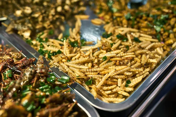 Street market showcase with cooked insects in Thailand — Stock Photo, Image