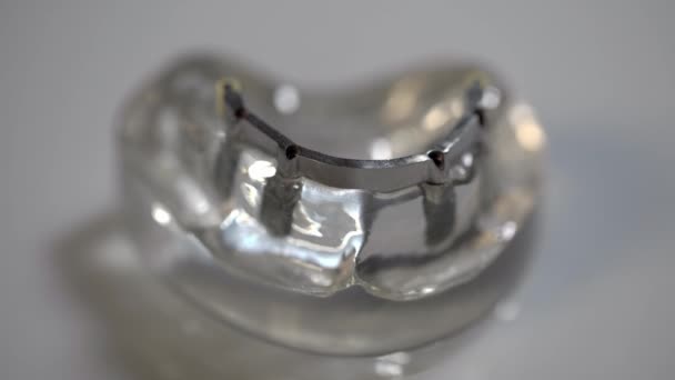 Closeup view at dental jaw model in laboratory — Stock Video