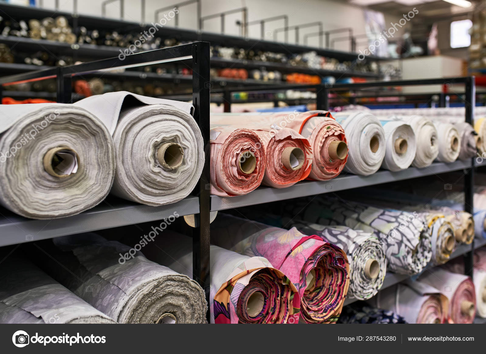 Fabric Store Warehouse With Stacked Colored Rolls Of Fabrics For Sewing  Tissue Stillage Closeup Stock Photo - Download Image Now - iStock