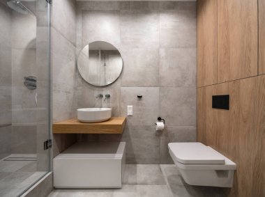 Hafif karo duvarlar ve zemin ile şık modern banyo