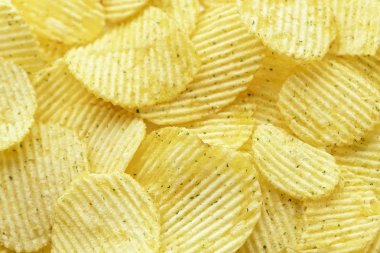 İştah açıcı soyulmuş cips. Yemek fişleri arka plan. Gıda arka plan.