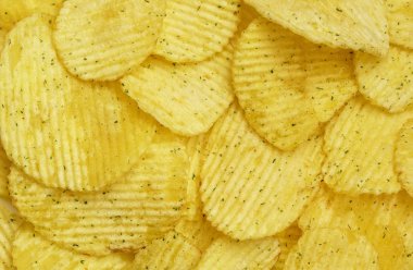 İştah açıcı soyulmuş cips. Yemek fişleri arka plan. Gıda arka plan.