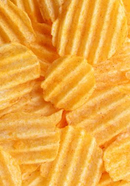 İştah açıcı soyulmuş cips. Yemek fişleri arka plan. Gıda arka plan.