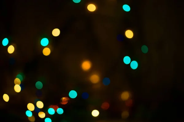 Mooie Bokeh Een Donkere Achtergrond Feestelijke Verlichting Garland Donkere Sleutel — Stockfoto