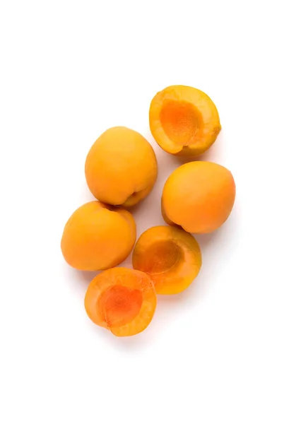 Ripe and tasty apricots on a white background — Stock Photo, Image