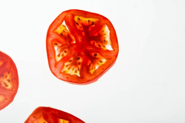 Tomato slice isolated on white background. Eco nature