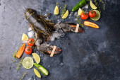 Картина, постер, плакат, фотообои "fresh lobster, ice, vegetables, lime, sprigs of razmarin, dark look. a dark background, a place for text.", артикул 393585628