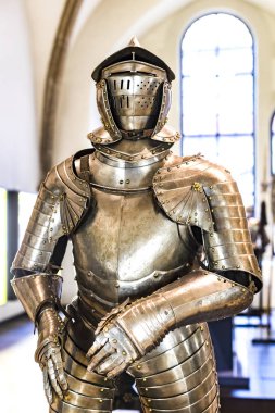 MUNICH, GERMANY - NOVEMBER 27, 2018 : The exposition of medieval armor and knight knights presented in the Bavarian National Museum in Munich. clipart