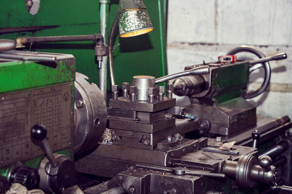 Metalworking machines working mechanisms are shot close-up 