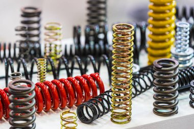 Multicolored metal of different sizes car springs  clipart