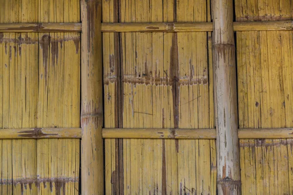 Background of wooden bamboo wall of a building in the Philippines close up