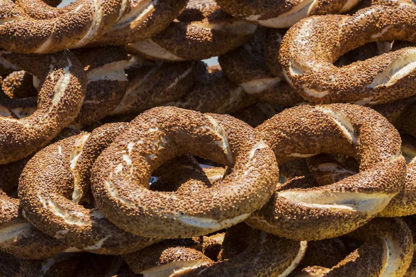 Background with Turkish bagels simit, close-ups