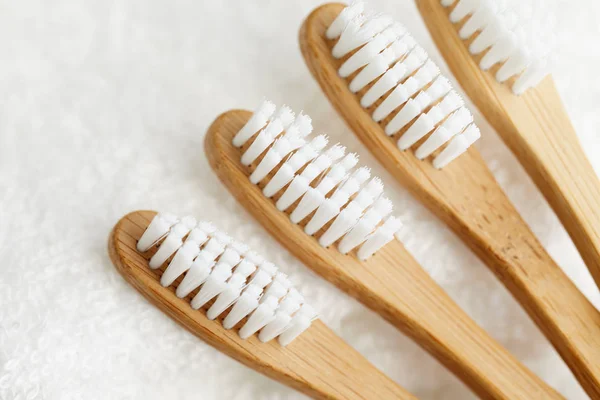 Close up of four bamboo toothbrushes — Stock Photo, Image