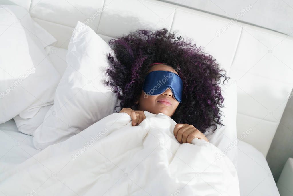 Tired Black Girl Waking Up In Bed With Sleep Mask