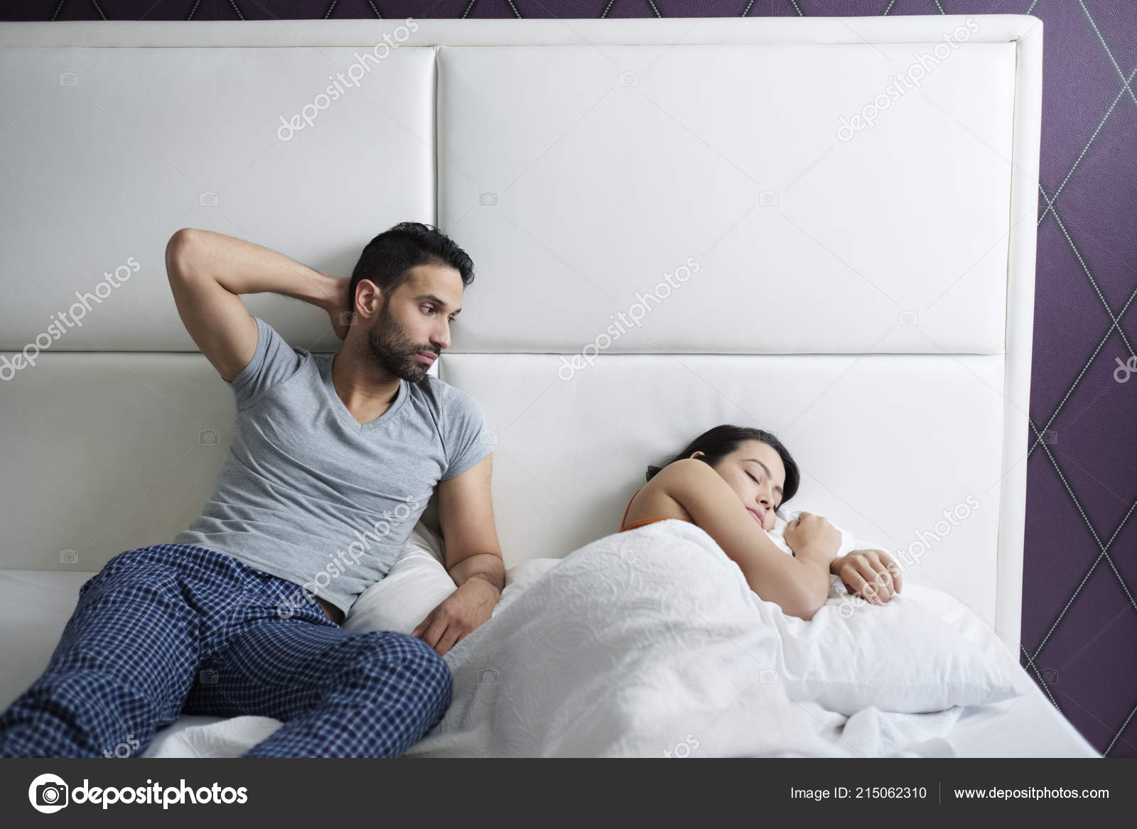 Man Trying Sexual Approach With Woman In Home Bed Stock Photo by ©diego_cervo 215062310 picture image