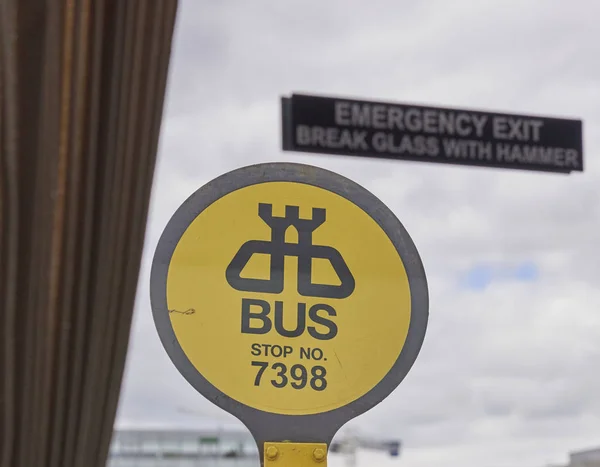 Dublin, Ireland yellow bus stop sign — Stock Photo, Image