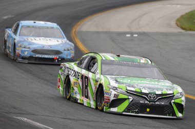 July 22, 2018 - Loudon, New Hampshire, USA: Kyle Busch (18) brings his car through the turns during the Foxwoods Resort Casino 301 at New Hampshire Motor Speedway in Loudon, New Hampshire. clipart