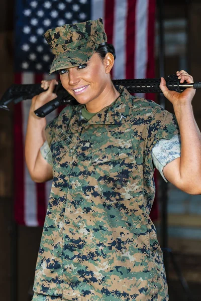 A female military Marine posing in a military uniform