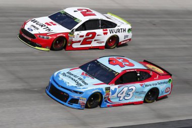 October 07, 2018 - Dover, Delaware, USA: Darrell Wallace, Jr (43) and Brad Keselowski (2) battle for position during the Gander Outdoors 400 at Dover International Speedway in Dover, Delaware. clipart