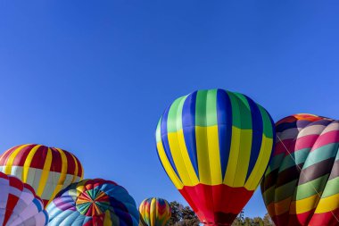 Fans enjoy a balloon launch at a local festival