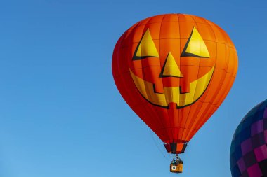 Fans enjoy a balloon launch at a local festival