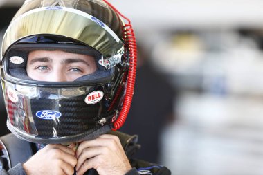 November 09, 2018 - Avondale, Arizona, USA: Ty Majeski (60) hangs out in the garage prior to for the Whelen Trusted to Perform 200 at ISM Raceway in Avondale, Arizona. clipart
