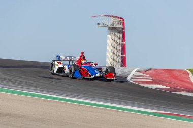 Matheus Leist (4) Brezilya uygulamaları sırasında döner devre Of Americas Austin, Teksas, IndyCar bahar Test için geçer.