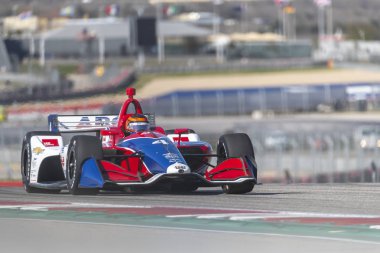 Matheus Leist (4) Brezilya uygulamaları sırasında döner devre Of Americas Austin, Teksas, IndyCar bahar Test için geçer.