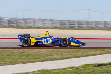 Alexander Rossi (27) Amerika Birleşik Devletleri'nin uygulamaları sırasında döner devre Of Americas Austin, Teksas, IndyCar bahar Test için geçer.